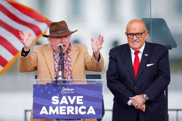 <p>Chapman University law professor John Eastman, next to U.S. President Donald Trump’s personal lawyer Rudy Giulian.</p>