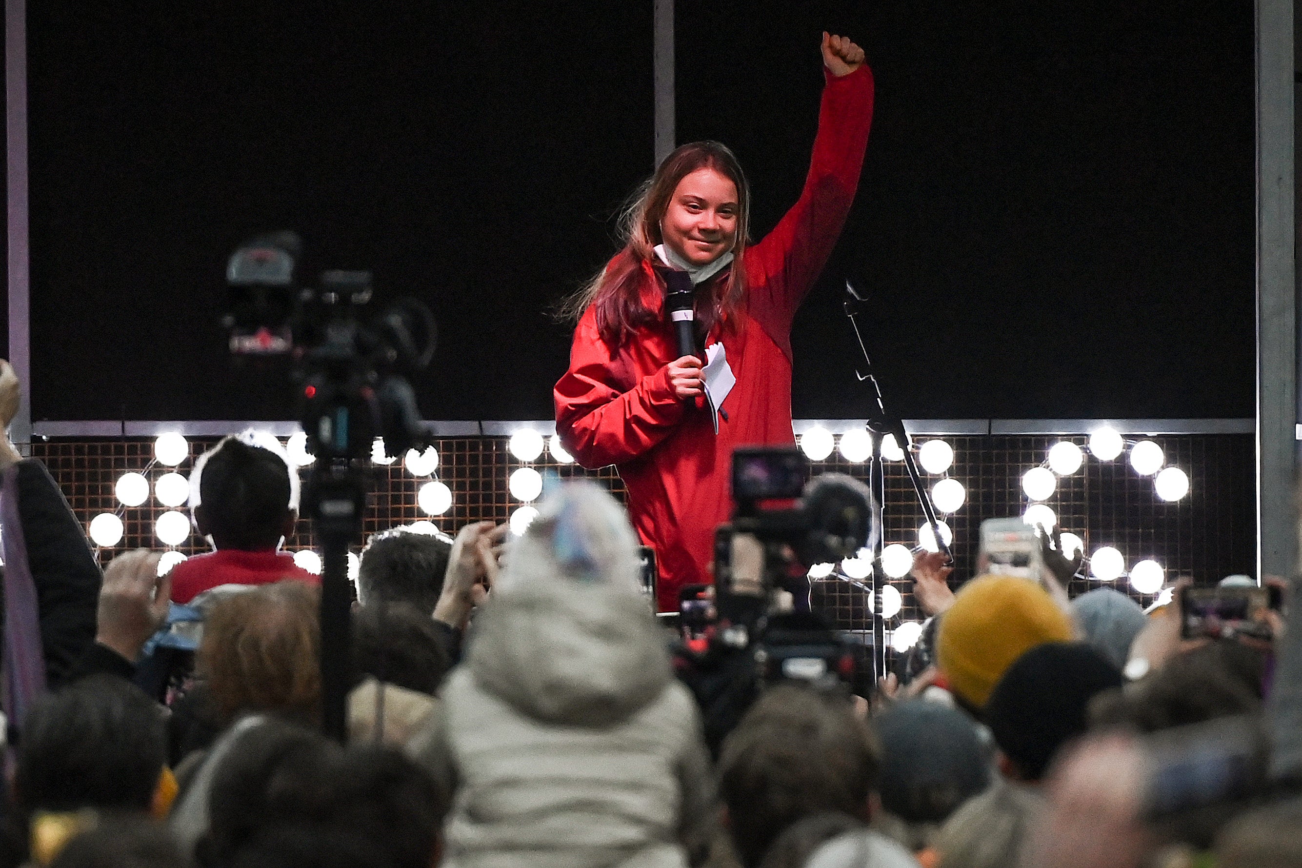 Greta Thunberg addresses activists onstage at George Square