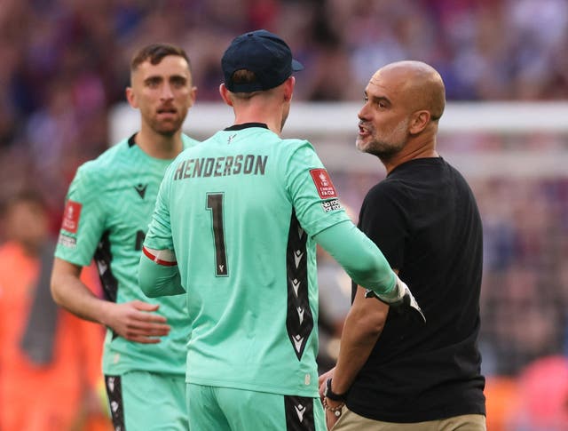 <p>Guardiola confronted Henderson as he attempted to shake his hand at full-time</p>
